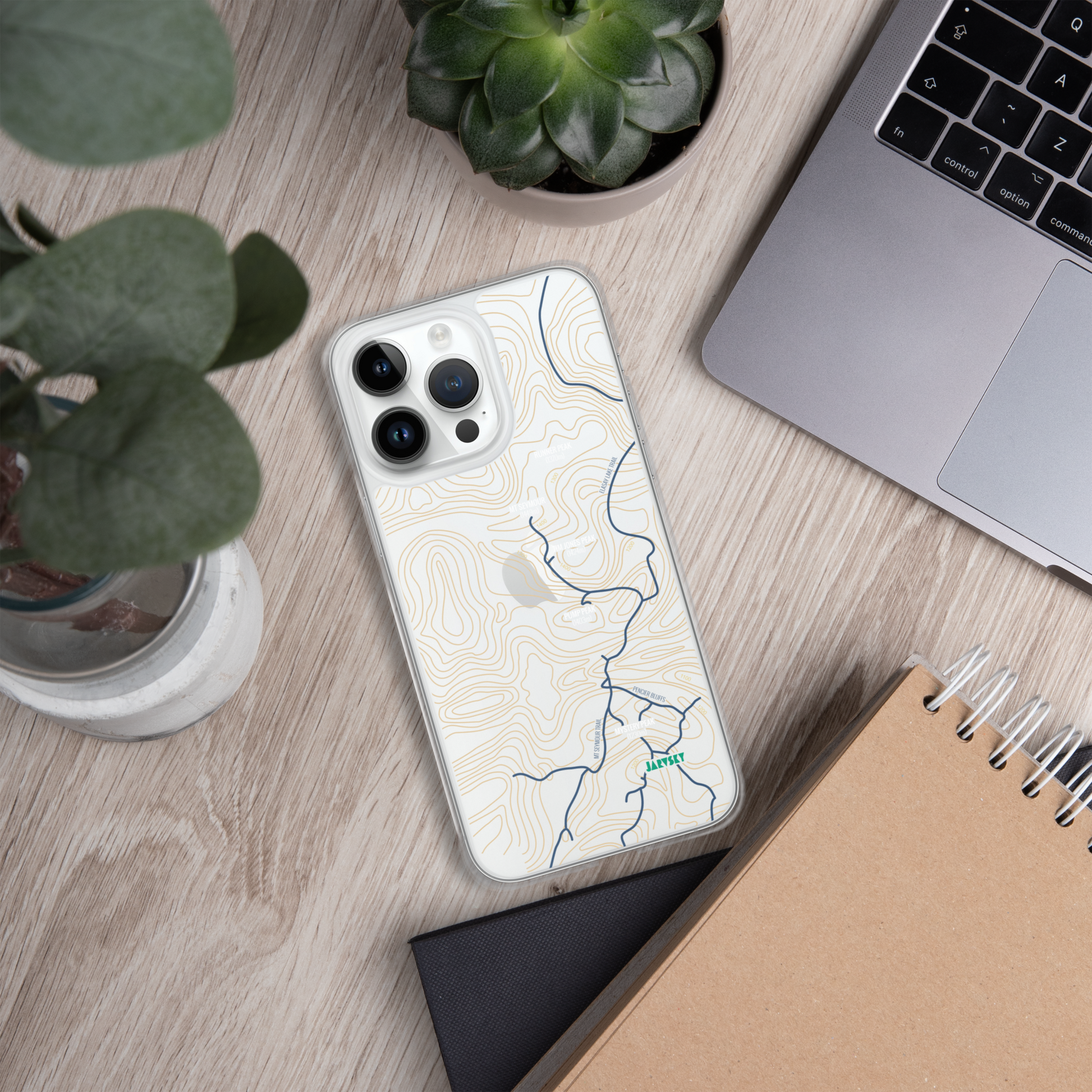 Jarvsky "MtSeymour" clearcase for iPhone-16-plus On Table laptop